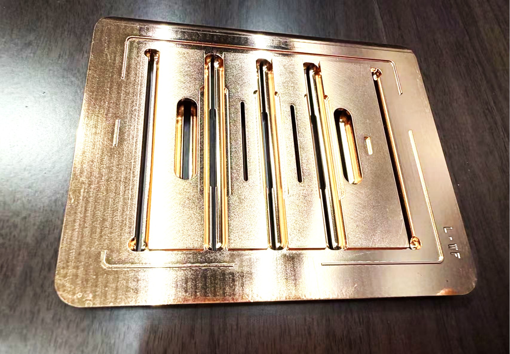 Forged copper flow plate with machined channels